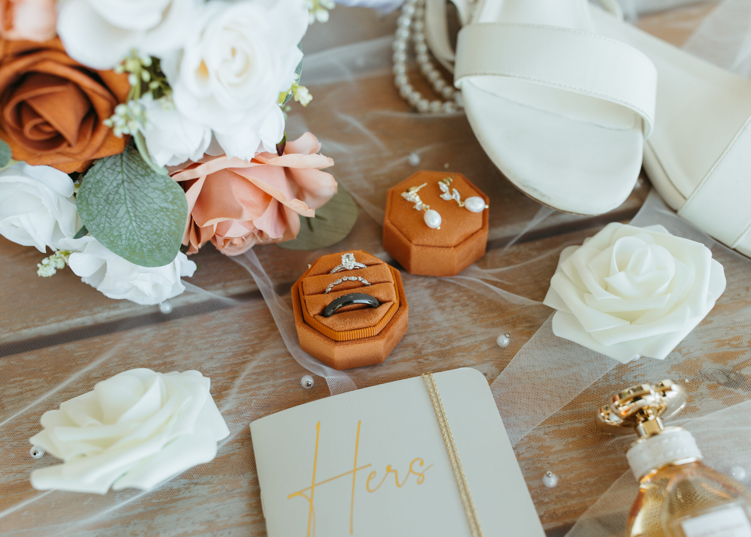 Bridal details and wedding rings at a Genesis Ranch wedding, styled by D'Amore Wedding and Event Planning and photographed by a Minneapolis wedding photography professional.