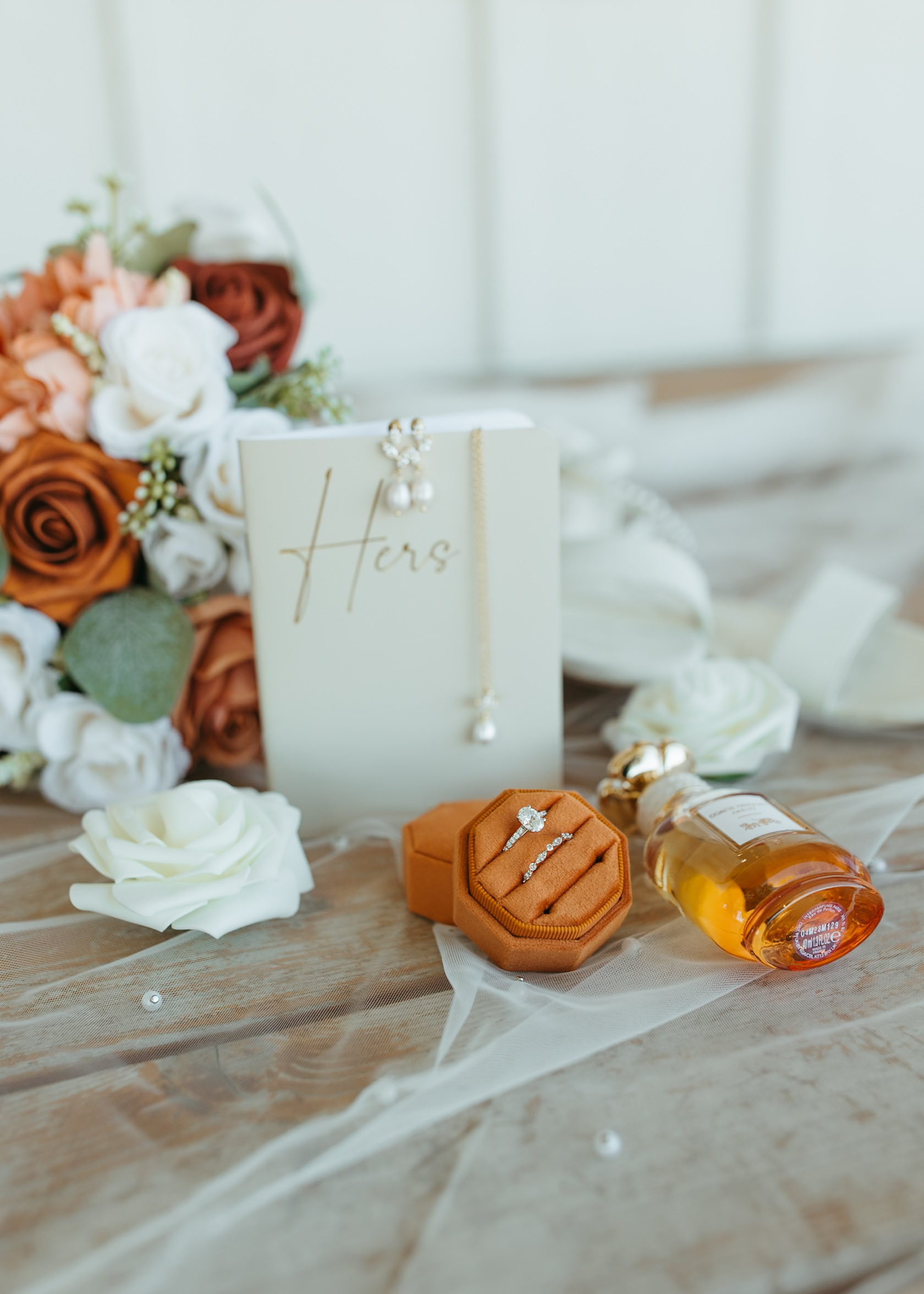 Bridal details and wedding rings at a Genesis Ranch wedding, styled by D'Amore Wedding and Event Planning and photographed by a Minneapolis wedding photography professional.