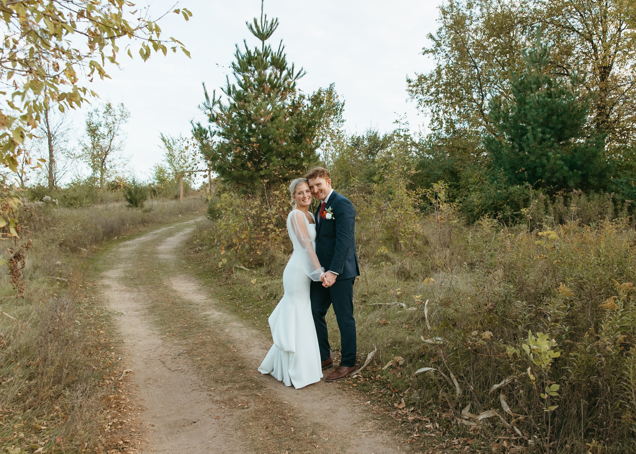 Minneapolis Minnesota wedding photography couple on local trail in minnesota after getting married 